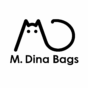 A logó egy M és D betű egybeírva, ami cicát formáz. Az M betű felső csücskei a cica fülei, a D-ből nincs a függőleges vonal, az ív pedig a cica farka. A logó alatt felirat: M. Dina Bags