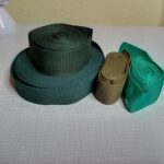 a képen táska pántokat, hevdereket látunk különböző szélességben fűzöld, sötétzöld, méregzöld és khaki színekben