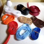 a képen fehér, fekete, bordó, narancssárga, piros, világoskék, királykék, világosbarna és sötétbarna tépőzárak láthatóak